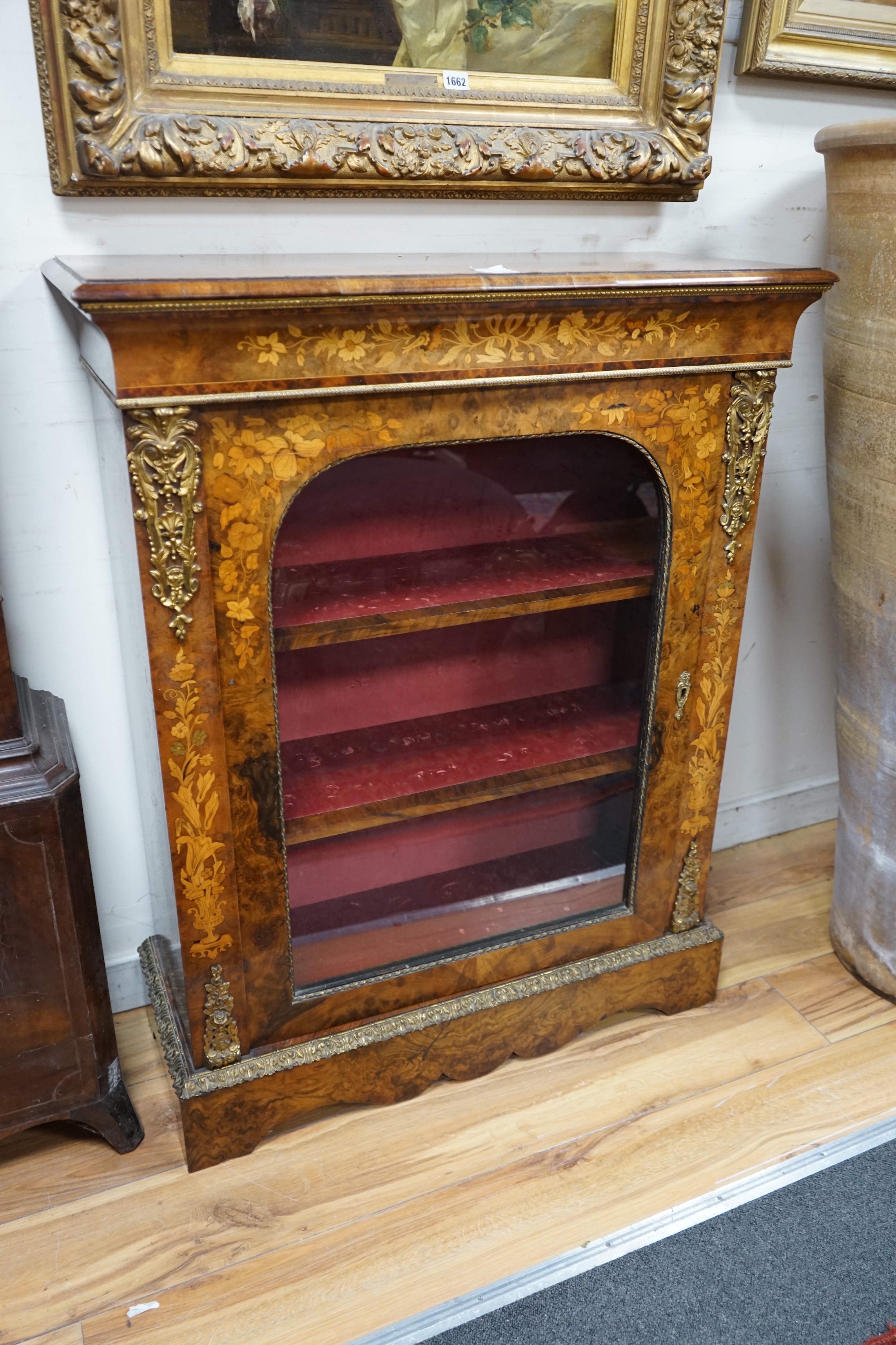 A Victorian burr walnut and floral marquetry inlaid gilt metal mounted pier cabinet, width 82cm, depth 34cm, height 105cm